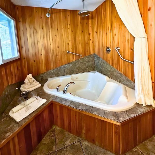 A Chalet bathroom showcasing the luxusious Hydro-Thermo Massage Tub that the whole family will love.