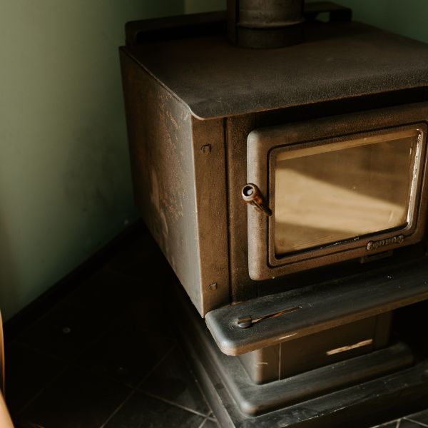 Wood burning fireplace where couples can curl up and enjoy time together.