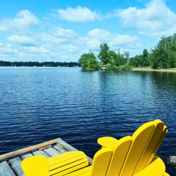 Patio chair on Inverness' dock with a gorgeous view of Brereton Lake.