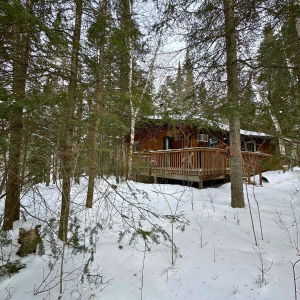 Winter exterior of Inverness Falls Resort chalet, which are open in the winter.