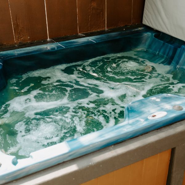 Outdoor hot tub at Cabin 7.