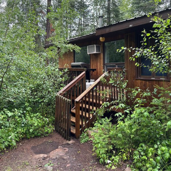 Exterior summer shot featuring a chalet at Inverness Falls Resort in the heart of the Whiteshell Provincial Park.