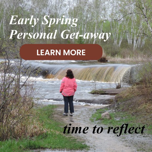 April special poster of woman looking at a waterfall.